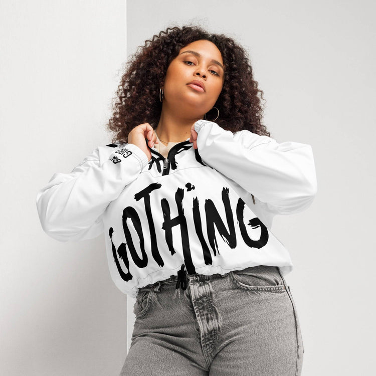 Plus-size model wearing white cropped windbreaker with &