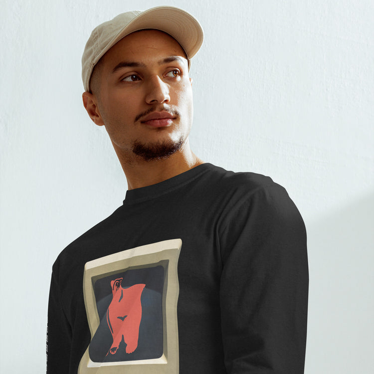 Man wearing black TV Bear shirt with retro computer screen and red bear graphic. Relaxed fit unisex garment-dyed heavyweight cotton.