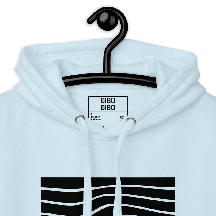 Close-up of the light blue hoodie’s hood and label, emphasizing the quality stitching and stylish design.