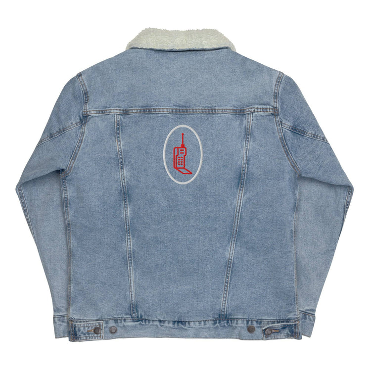Flat lay of light blue denim sherpa jacket with embroidered red phone graphic on the back. Eco-friendly design with white wool lining.