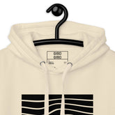 Close-up of the beige hoodie’s hood and label, showcasing the premium fabric and attention to detail.