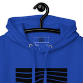 Close-up of the royal blue hoodie’s hood and inner label, highlighting the premium stitching and design details.