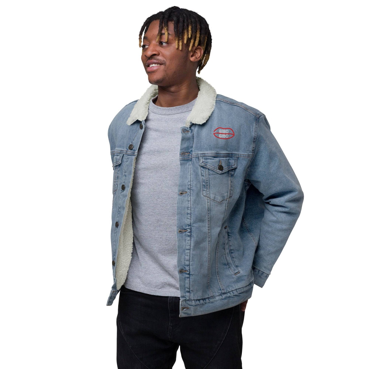 Light blue denim sherpa jacket with white wool lining, red chest logo, and dual chest pockets. Modeled with a casual gray shirt.
